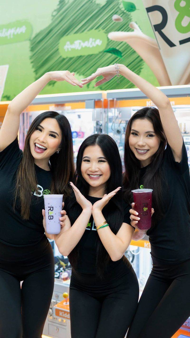 R&B TEA team members with branded drinks